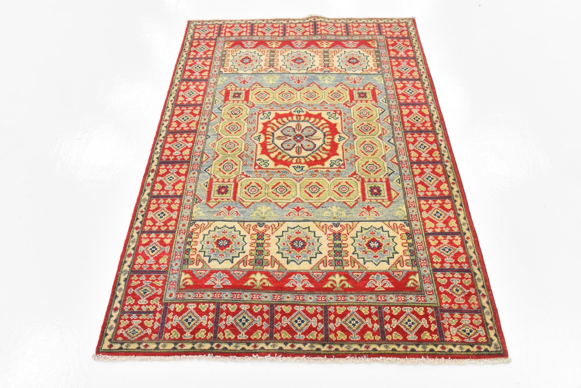 4' x 5' 10 Hand Knotted Kazak Rug