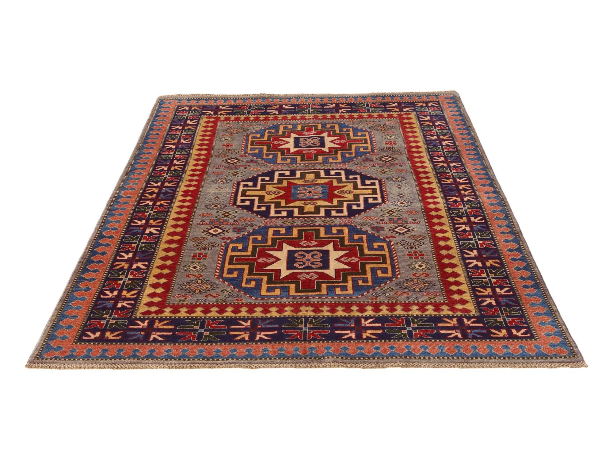 5' 5 x 8' Hand Knotted Kazak Rug