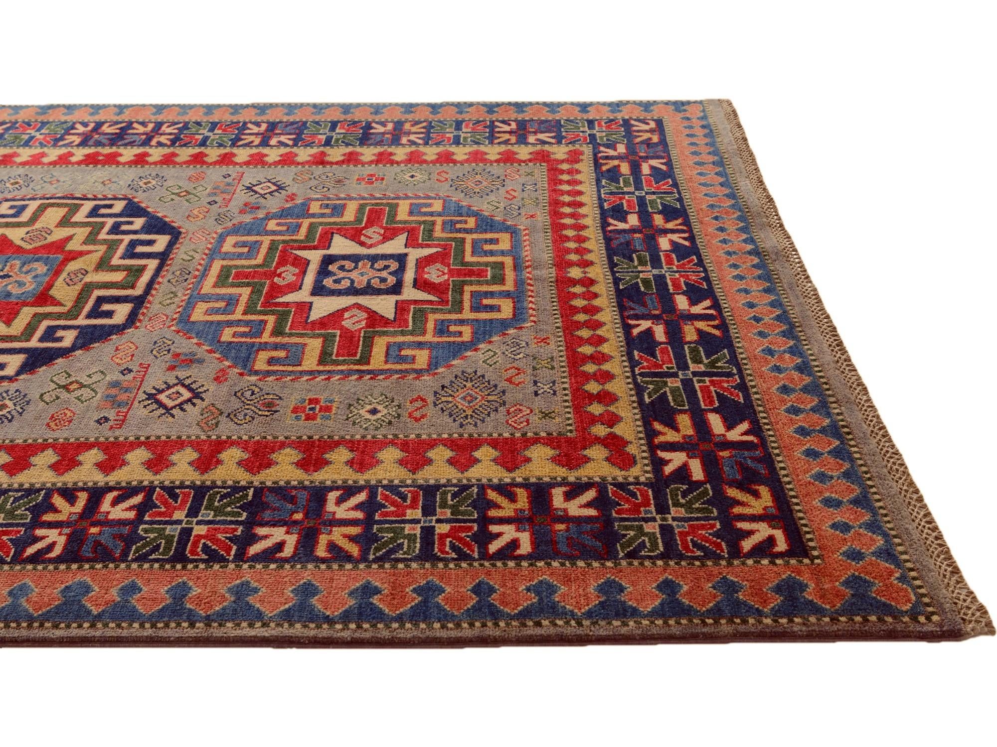 5' 5 x 8' Hand Knotted Kazak Rug