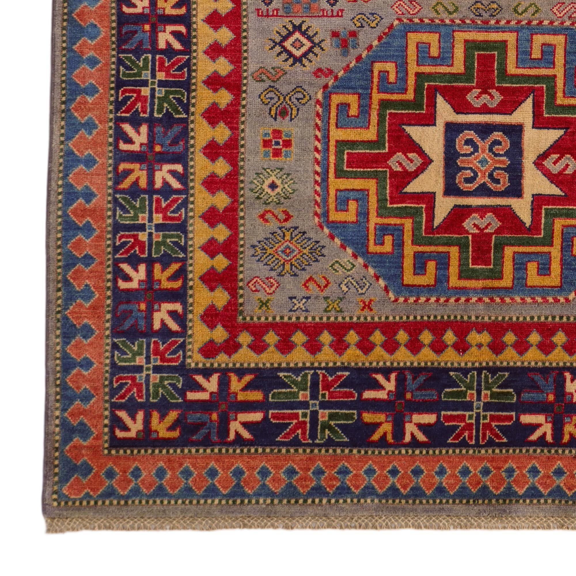 5' 5 x 8' Hand Knotted Kazak Rug