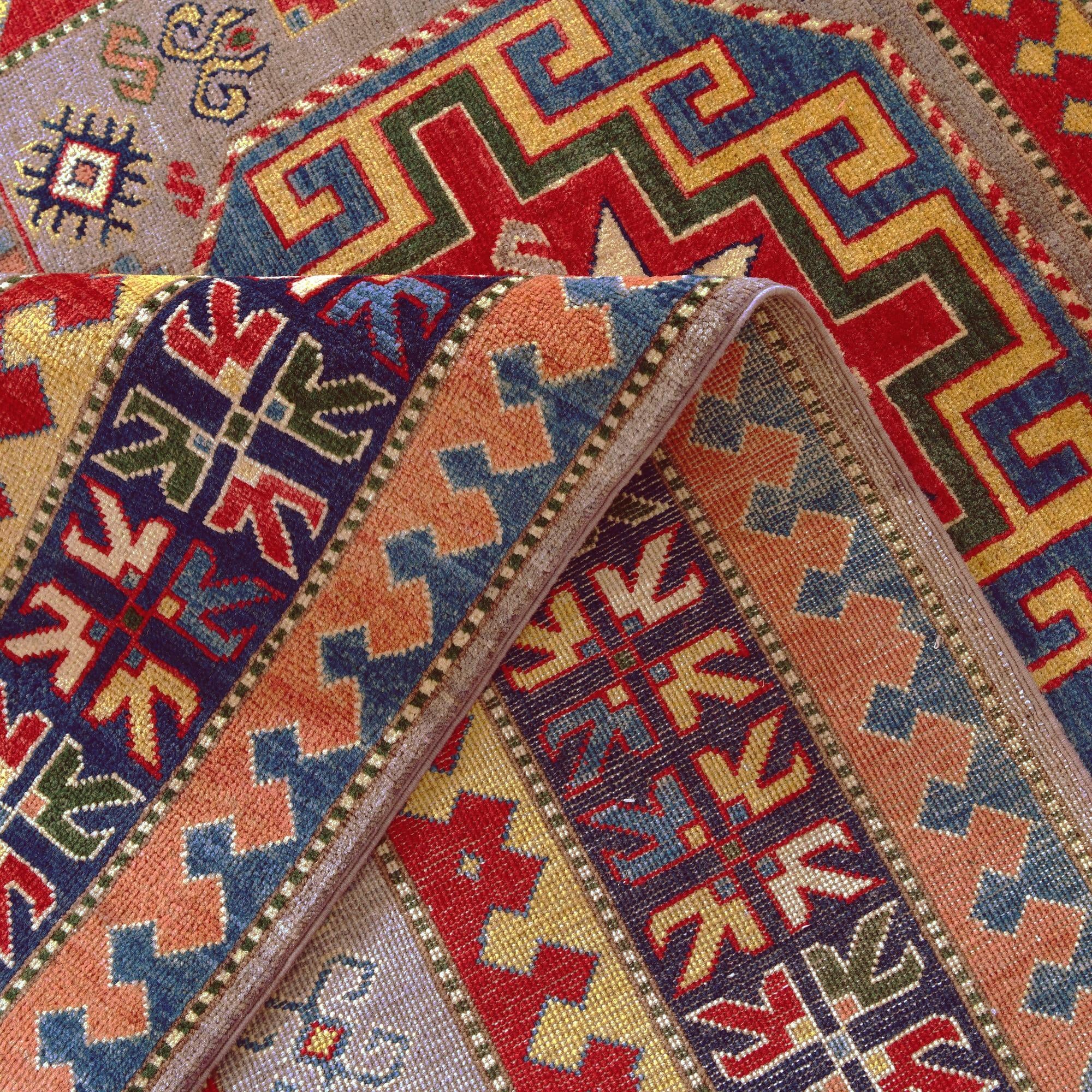 5' 5 x 8' Hand Knotted Kazak Rug