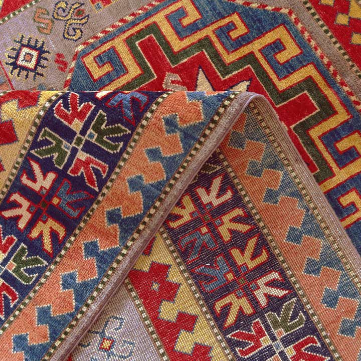 5' 5 x 8' Hand Knotted Kazak Rug