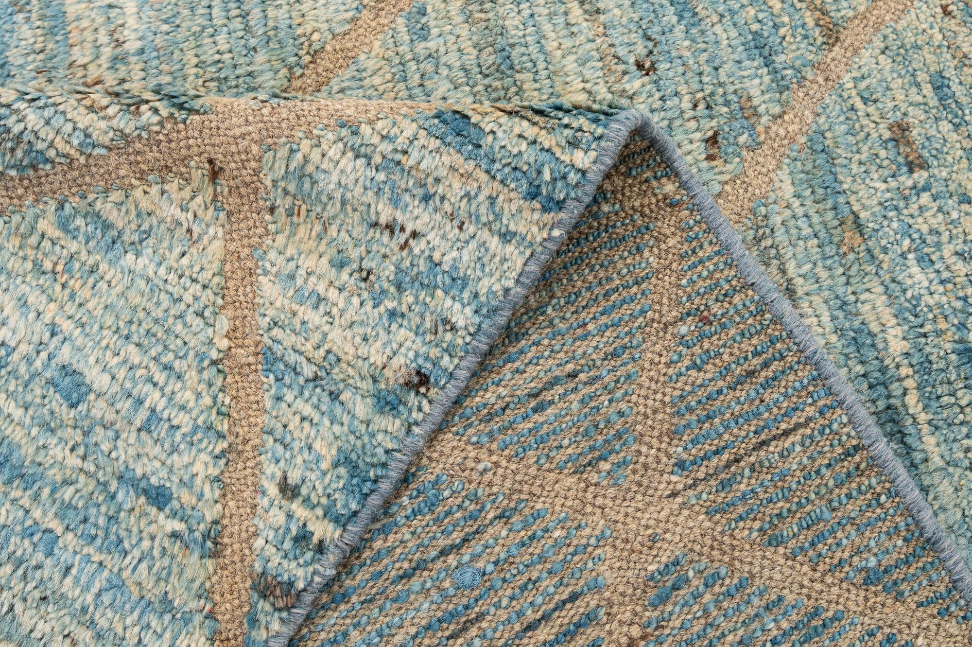 5' 9 x 8' 5 Hand Knotted Moroccan Wool Rug