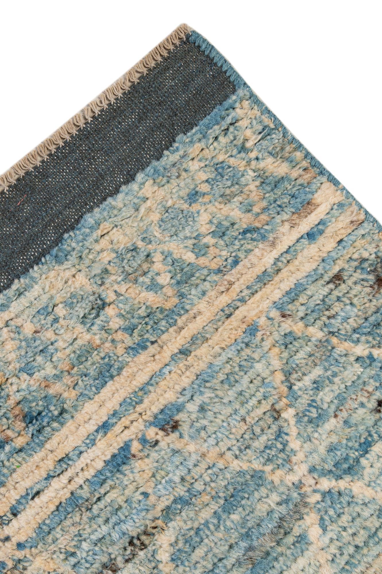 5' 11 x 9' 3 Hand Knotted Moroccan Wool Rug
