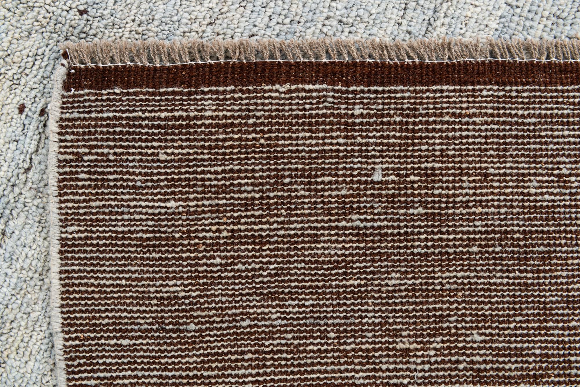 5' 8 x 8' 2 Hand Knotted Moroccan Wool Rug