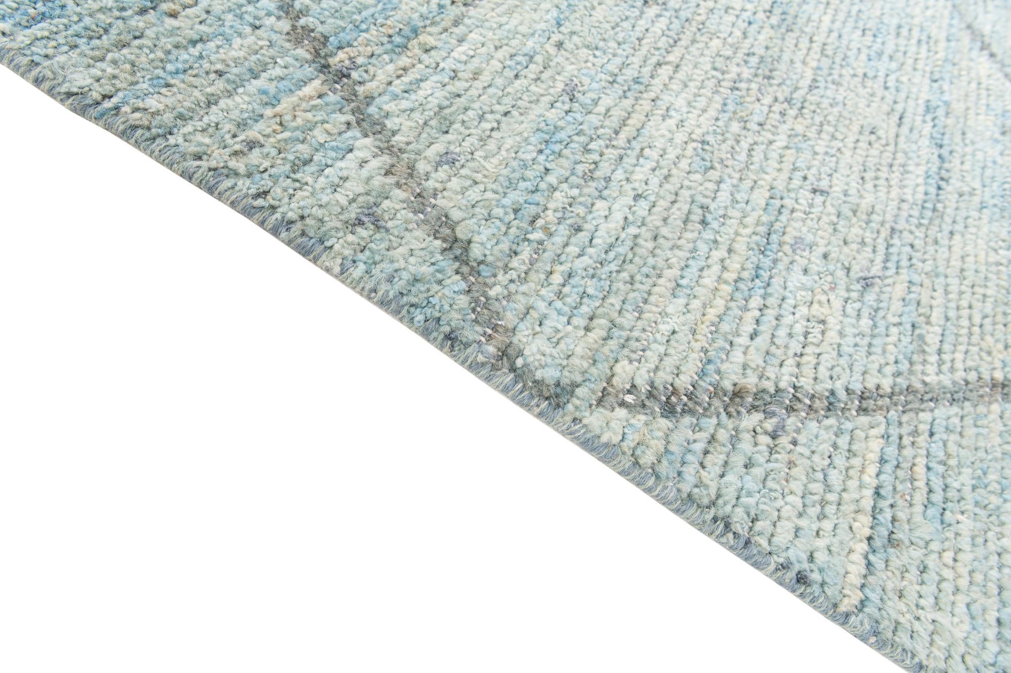5' 10 x 9' 3 Hand Knotted Moroccan Wool Rug