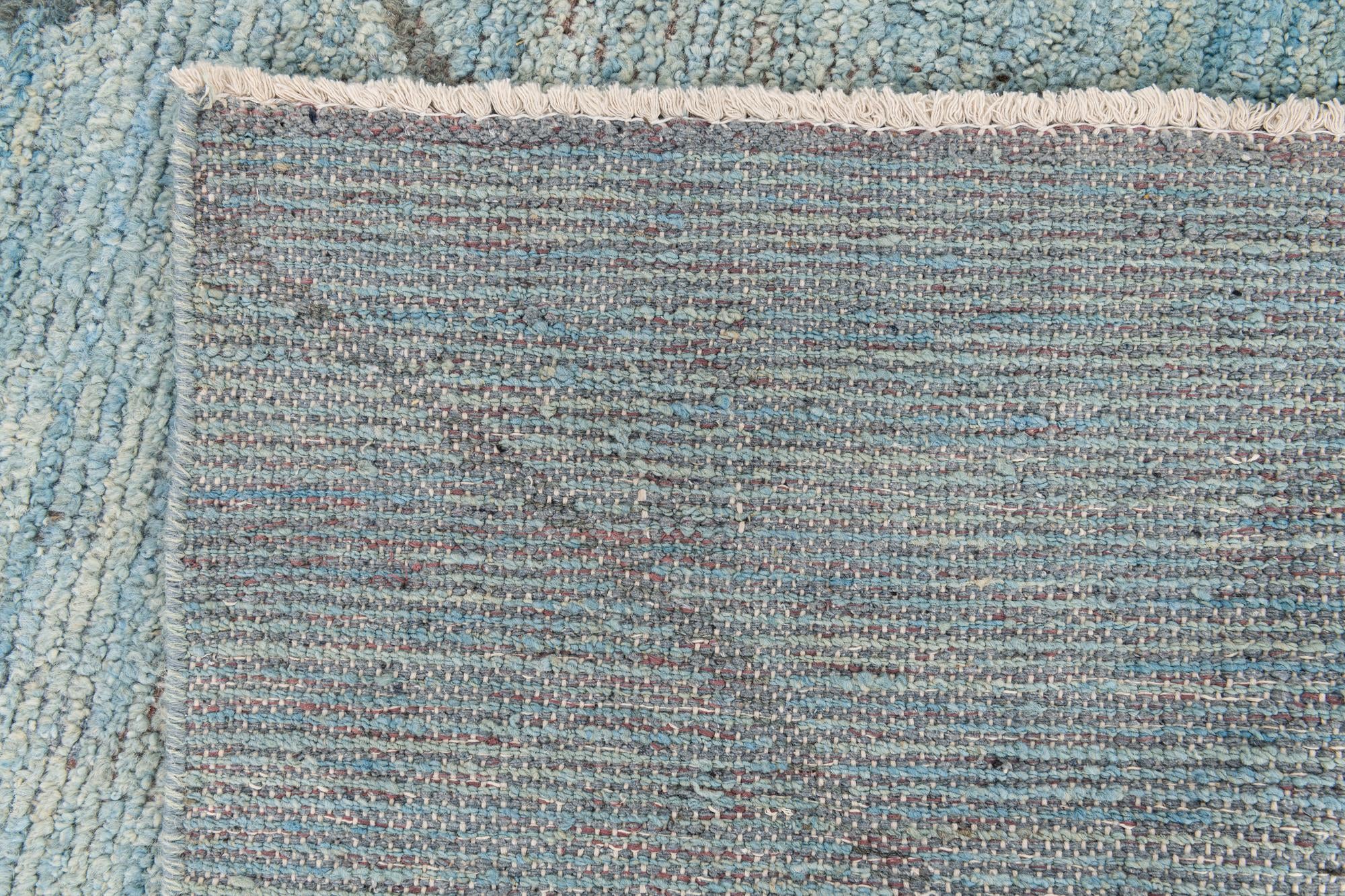 5' 10 x 9' 3 Hand Knotted Moroccan Wool Rug