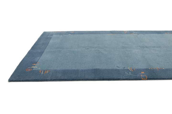 4' 9 x 6' 7 Hand Knotted Nepal Wool Rug