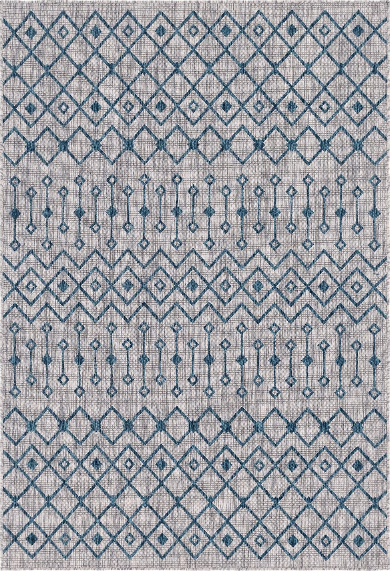 A 6x9 rectangular light blue and teal indoor/outdoor rug with a modern tribal lattice pattern.