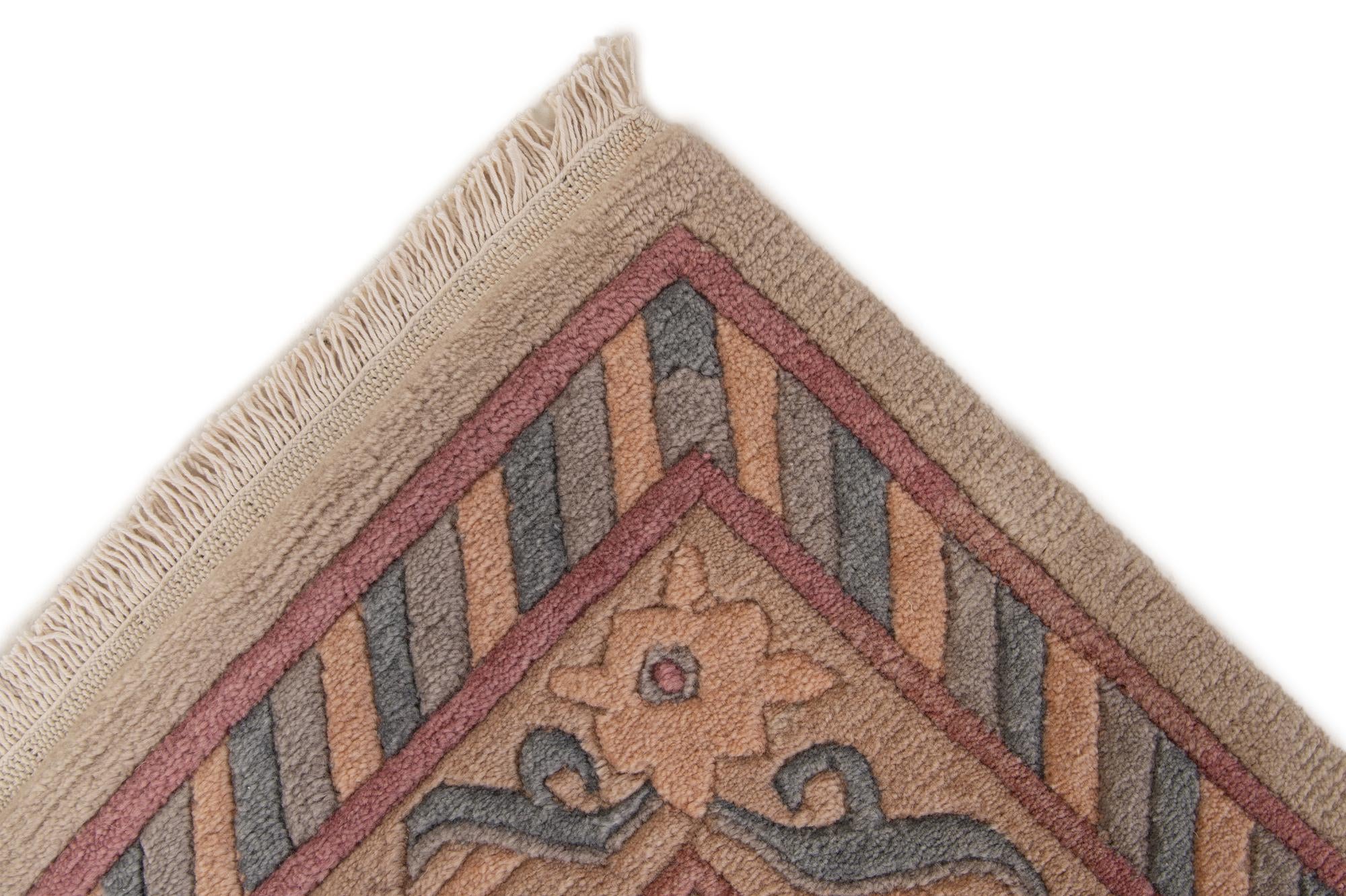4' 10 x 6' 5 Hand Knotted Tibet Wool Rug
