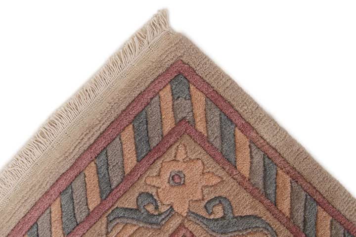 4' 10 x 6' 5 Hand Knotted Tibet Wool Rug