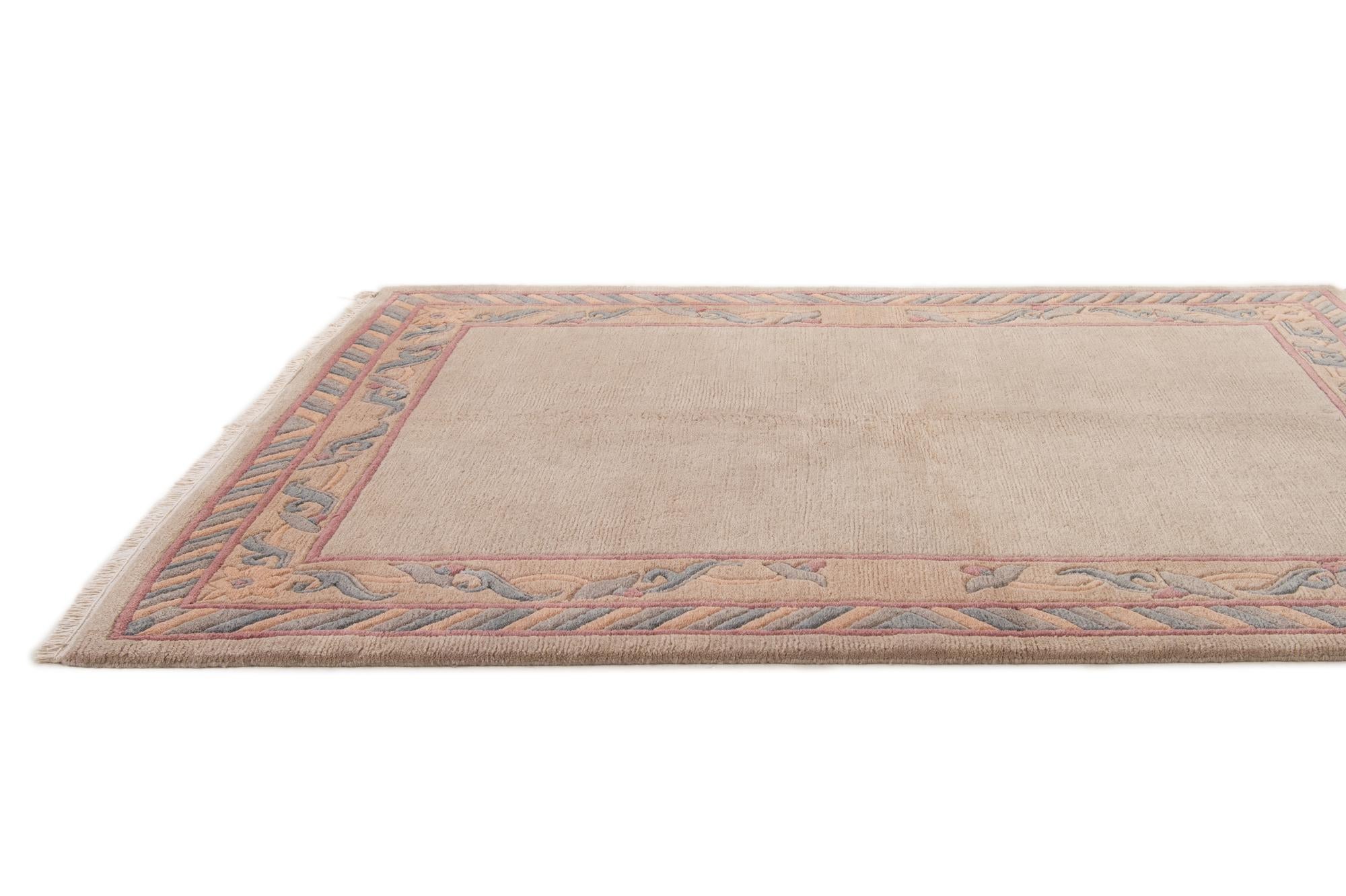 4' 10 x 6' 5 Hand Knotted Tibet Wool Rug