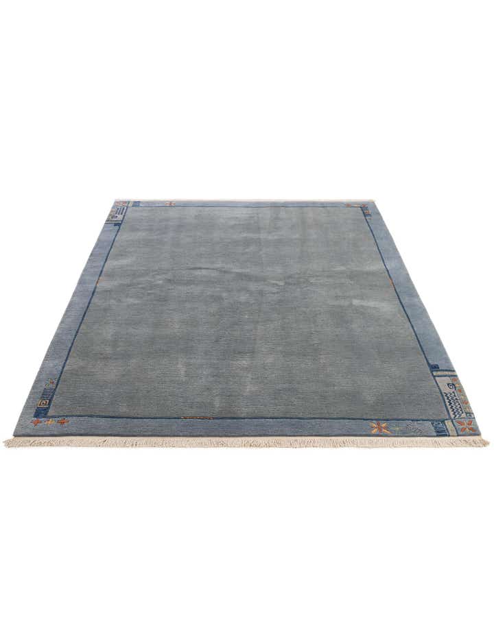 6' 9 x 8' 3 Hand Knotted Tibet Wool Rug