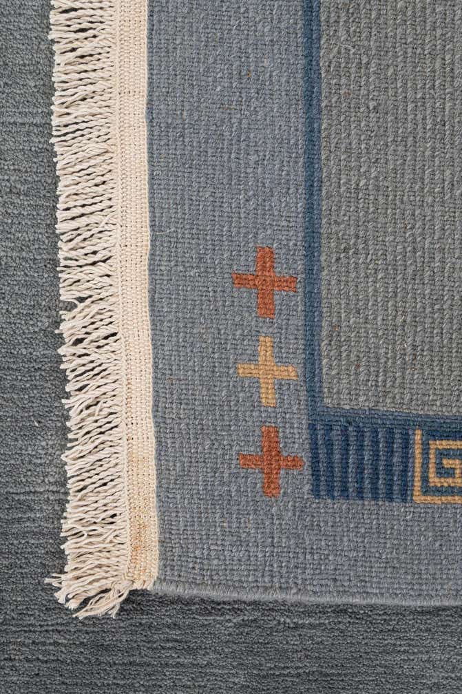 6' 9 x 8' 3 Hand Knotted Tibet Wool Rug
