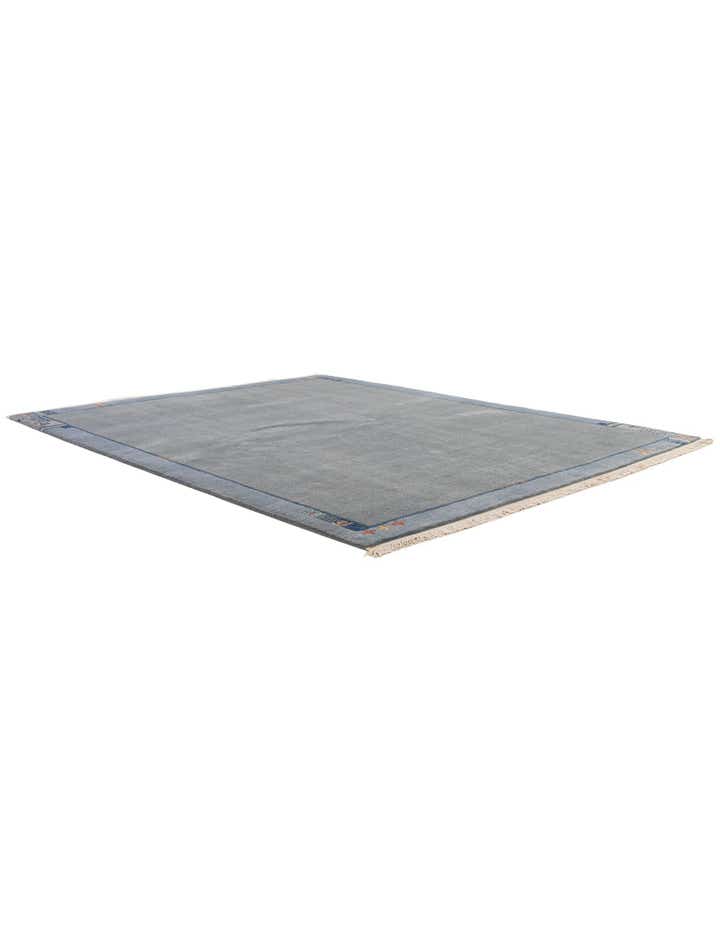 6' 9 x 8' 3 Hand Knotted Tibet Wool Rug