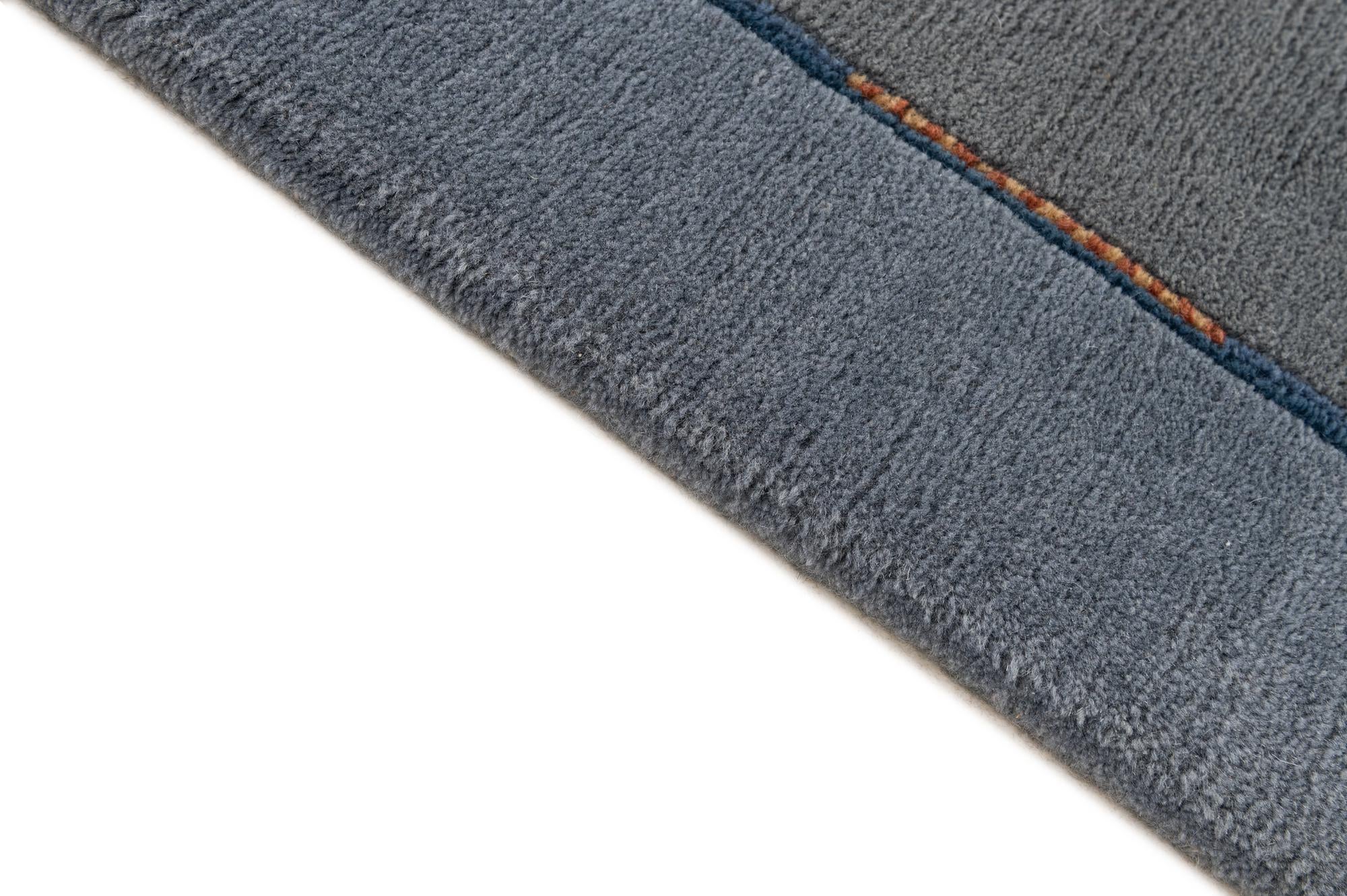 6' 9 x 8' 3 Hand Knotted Tibet Wool Rug