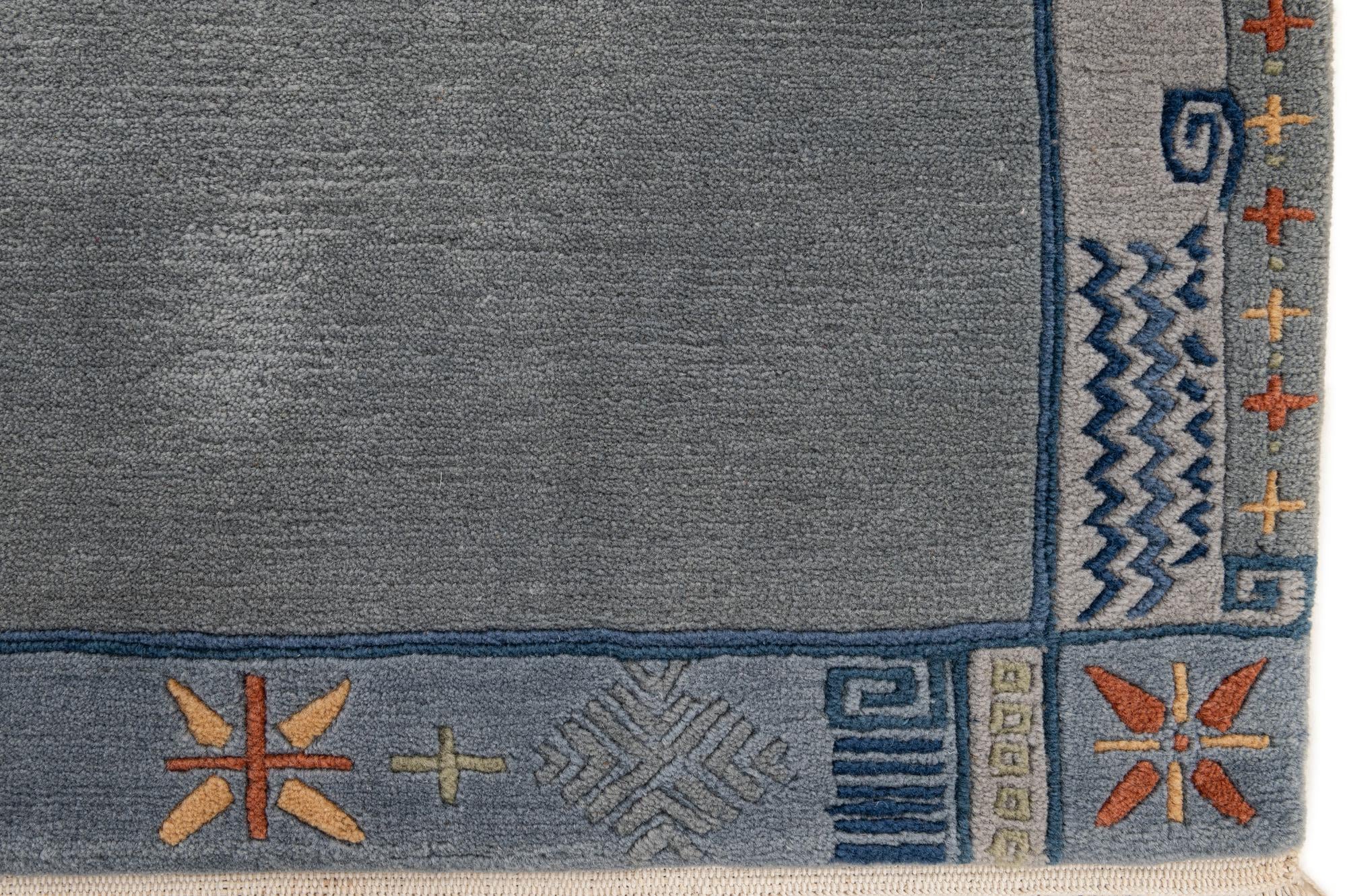 6' 9 x 8' 3 Hand Knotted Tibet Wool Rug