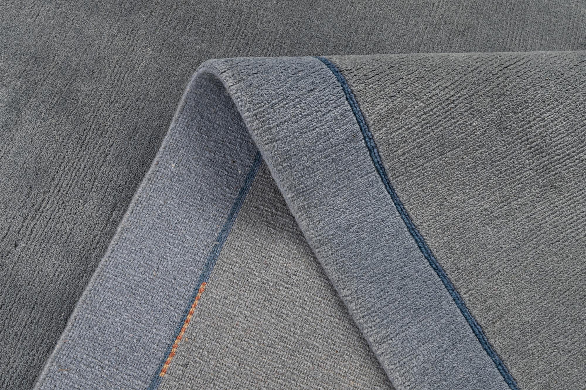 6' 9 x 8' 3 Hand Knotted Tibet Wool Rug
