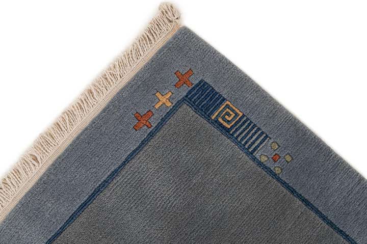 6' 9 x 8' 3 Hand Knotted Tibet Wool Rug