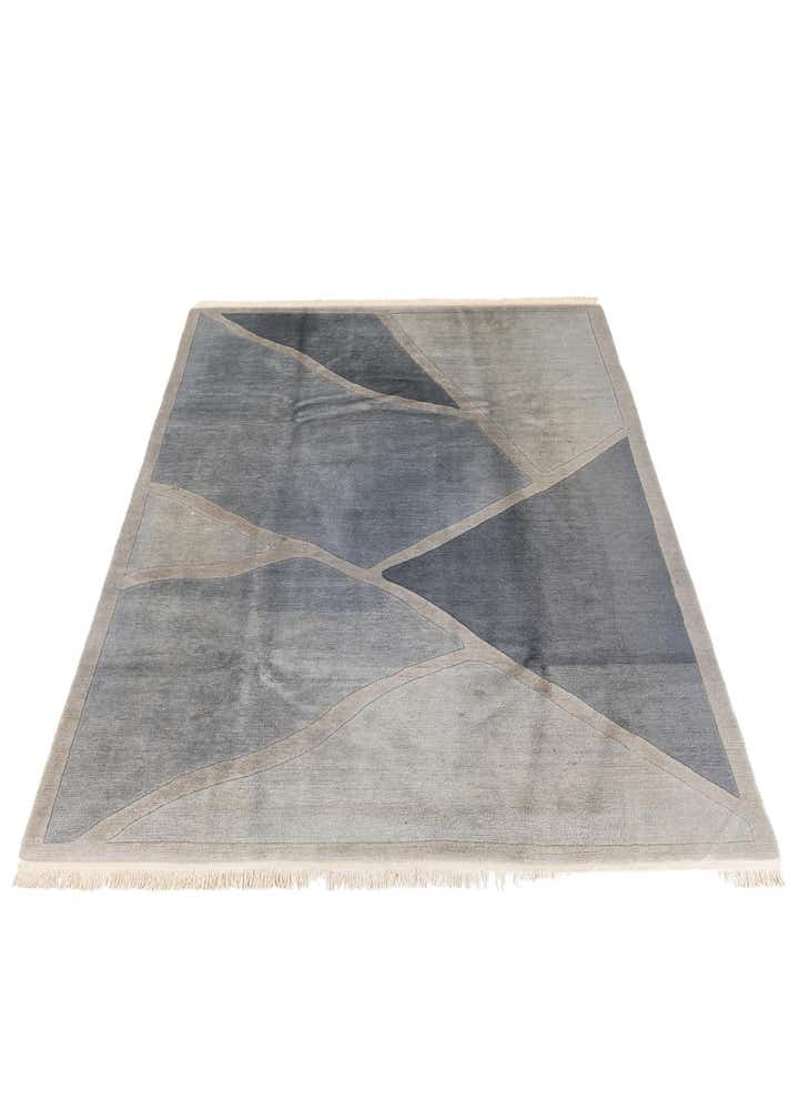 6' 7 x 9' 3 Hand Knotted Tibet Wool Rug