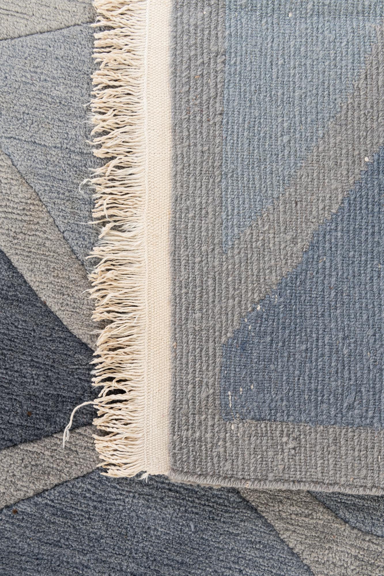 6' 7 x 9' 3 Hand Knotted Tibet Wool Rug