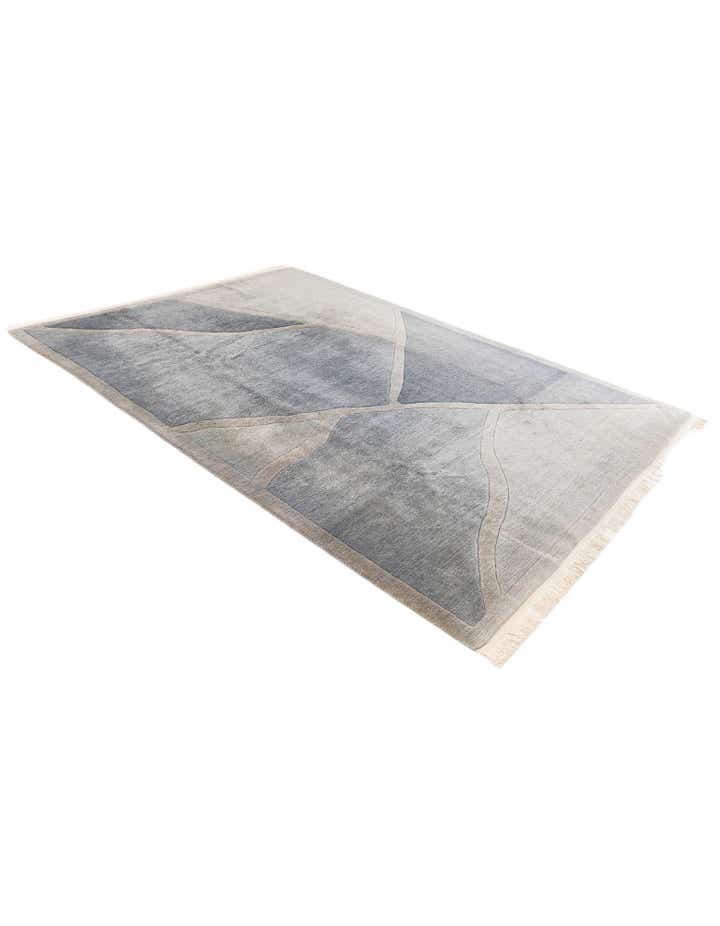 6' 7 x 9' 3 Hand Knotted Tibet Wool Rug