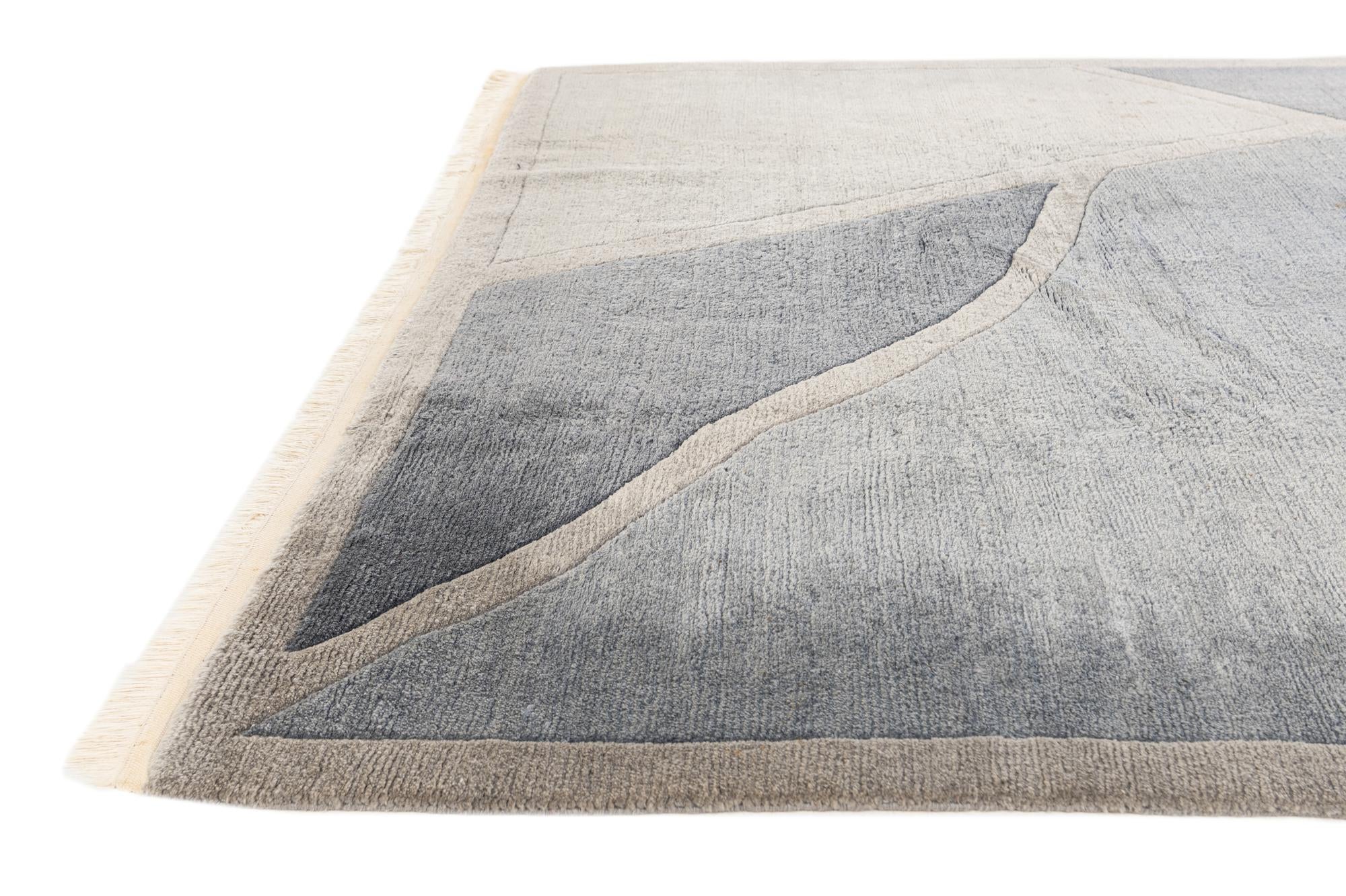 6' 7 x 9' 3 Hand Knotted Tibet Wool Rug