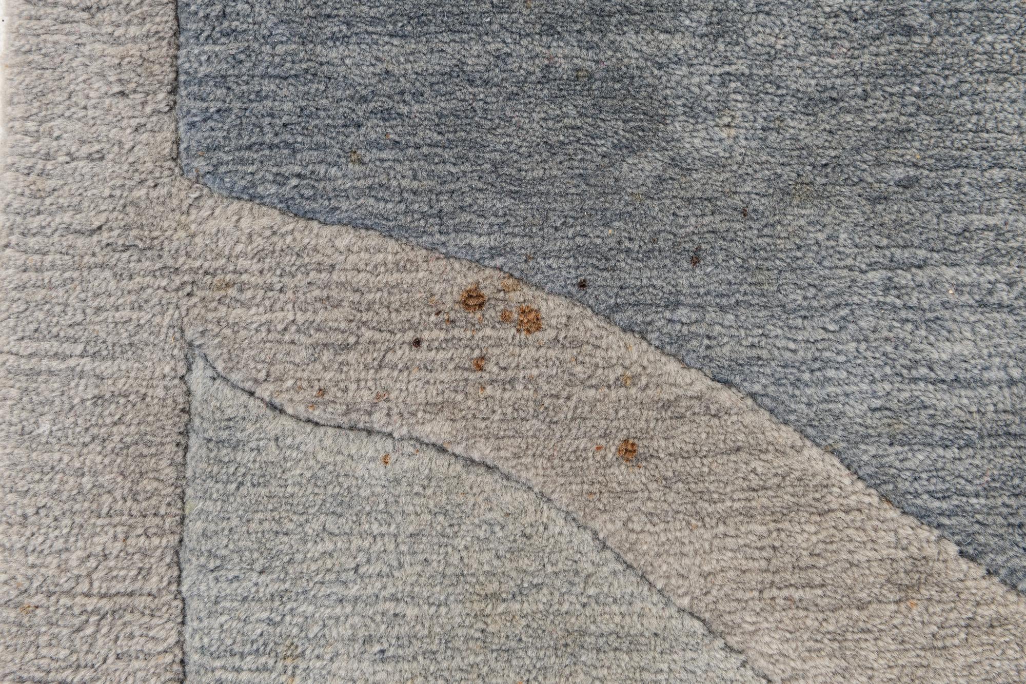 6' 7 x 9' 3 Hand Knotted Tibet Wool Rug