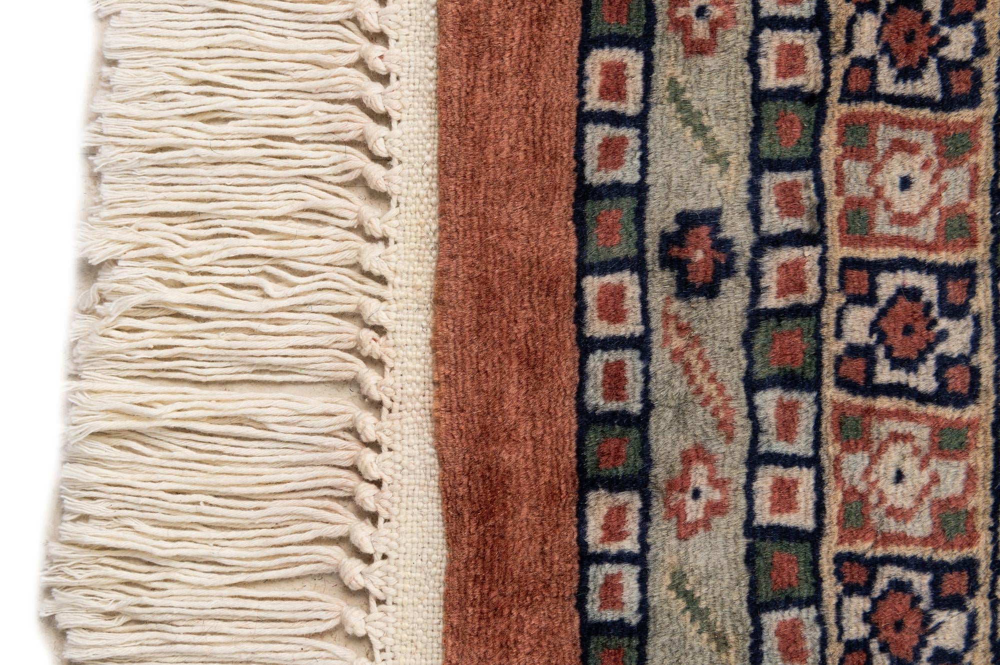 5' 4 x 8' 8 Hand Knotted Bokhara Oriental Wool Rug