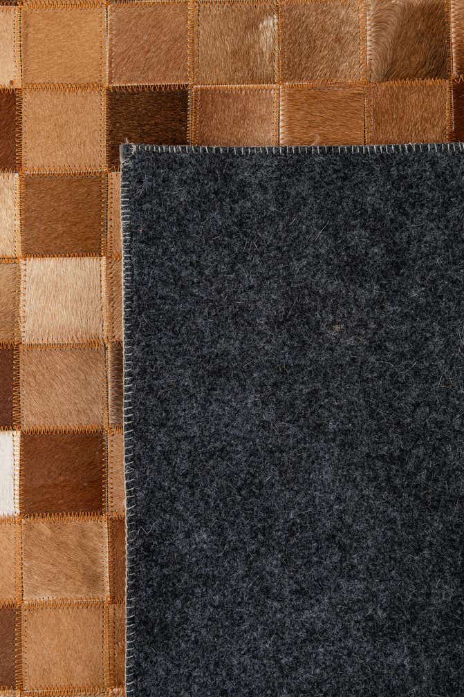 5' x 7' 11 Cowhide - Patchwork Rug