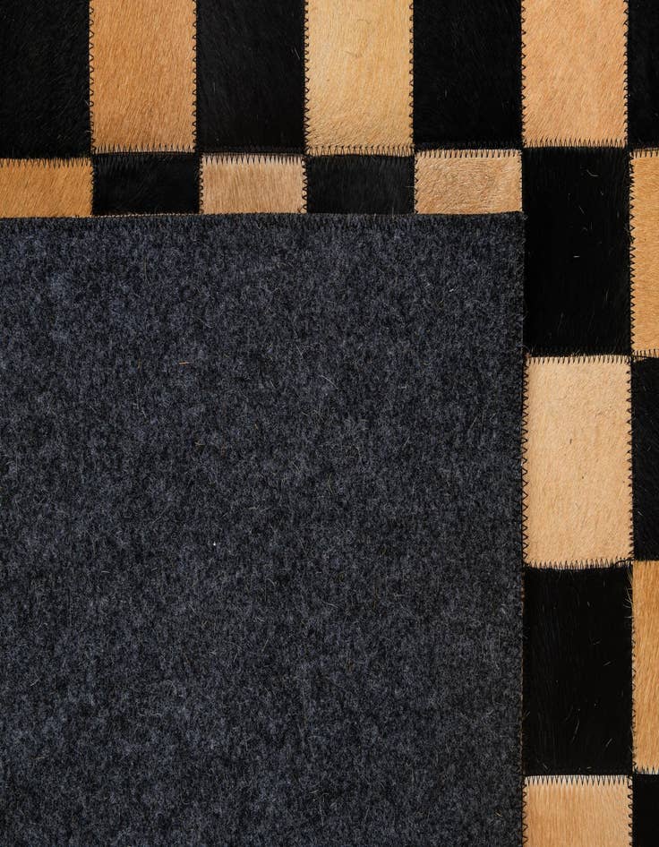 Detail image of 5' 1 x 8' Cowhide - Patchwork Rug