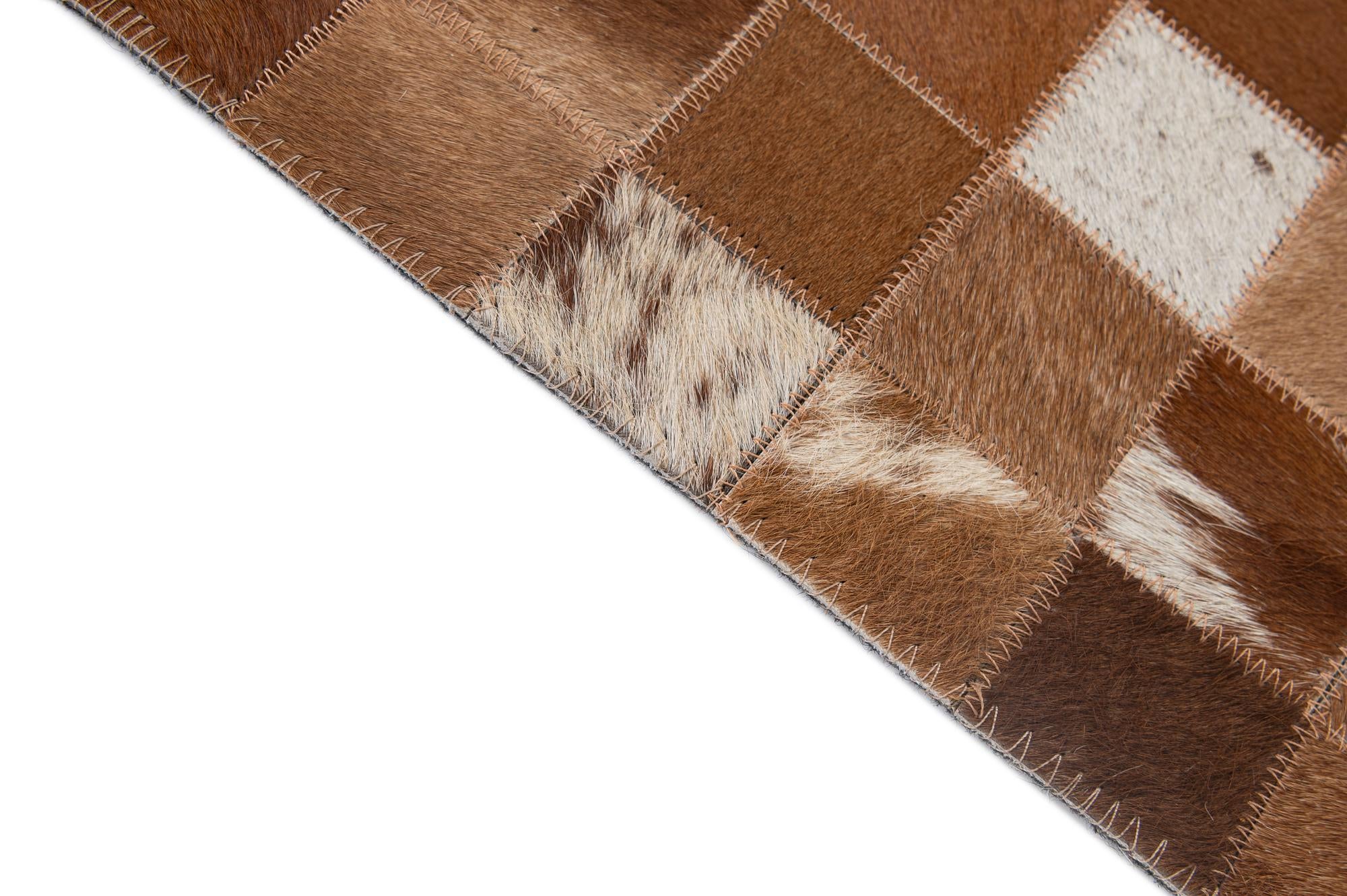 4' 11 x 7' 10 Cowhide - Patchwork Rug