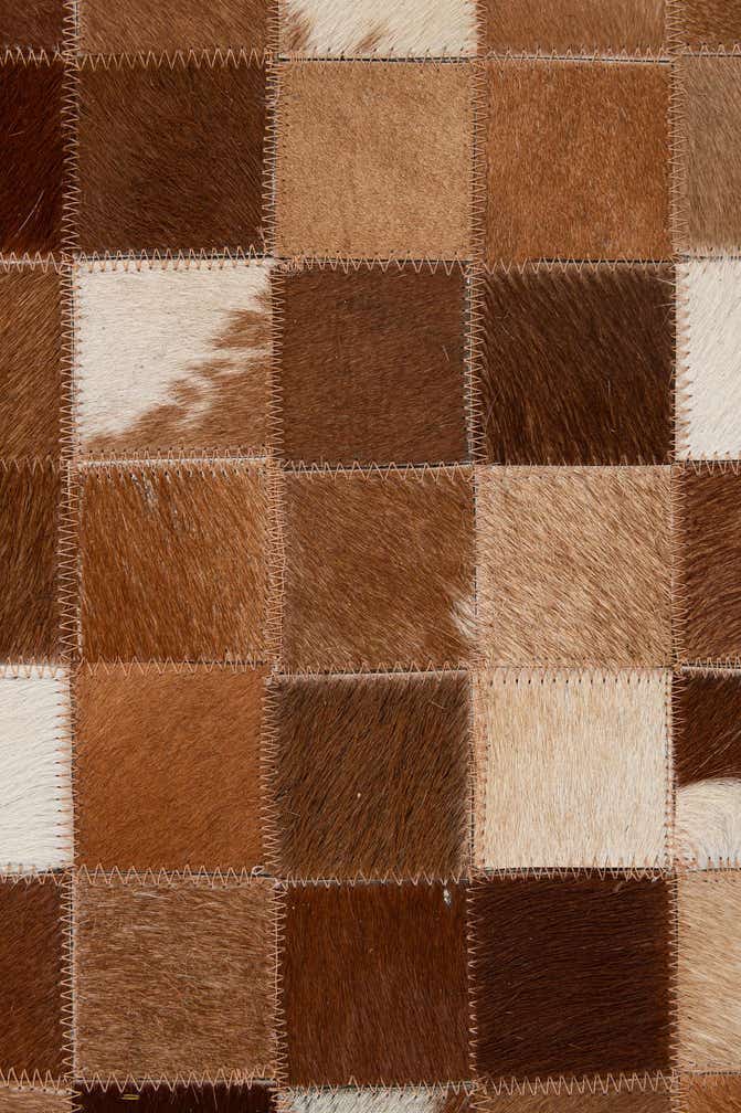 4' 11 x 7' 10 Cowhide - Patchwork Rug