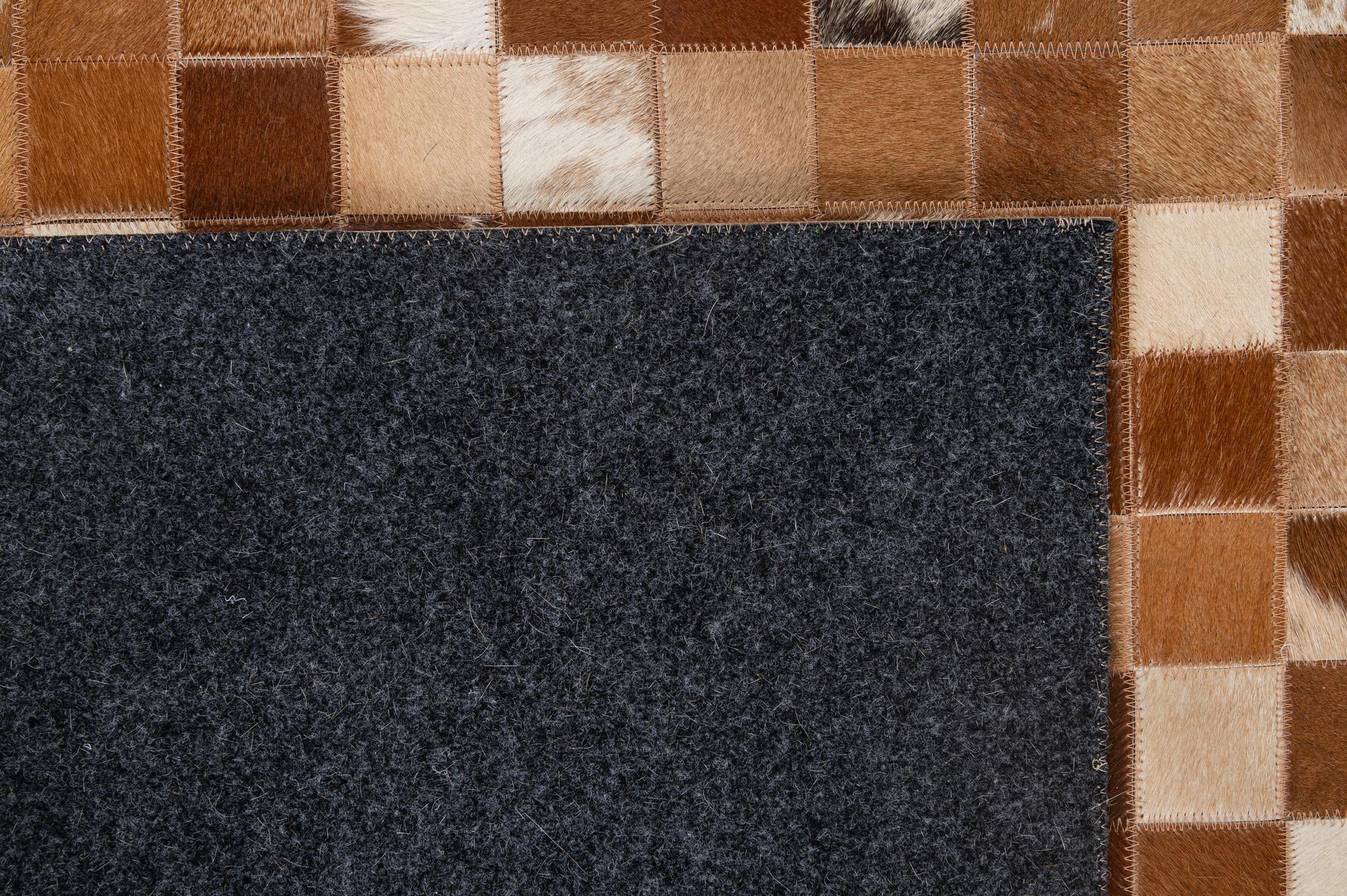 4' 11 x 7' 10 Cowhide - Patchwork Rug