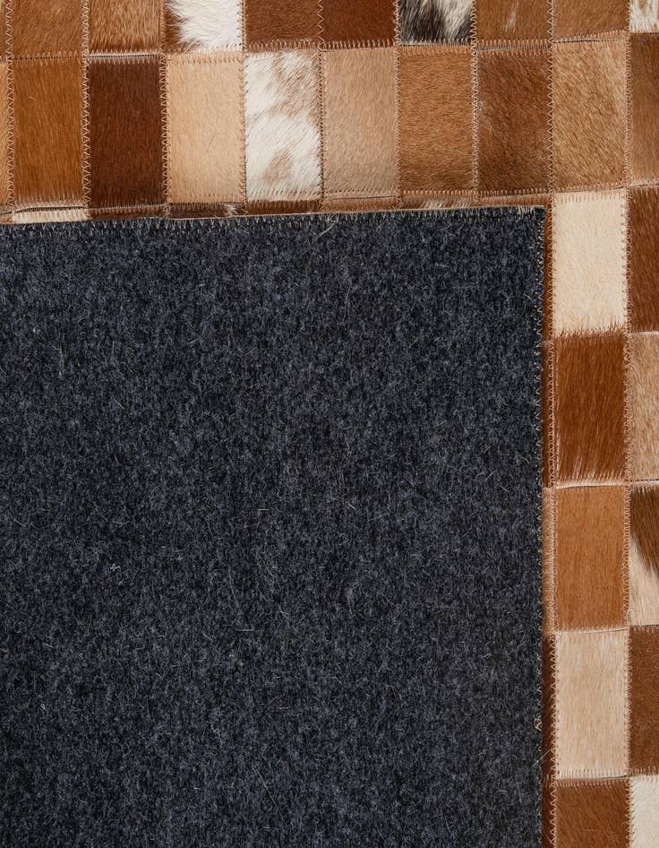 Detail image of 4' 11 x 7' 10 Cowhide - Patchwork Rug