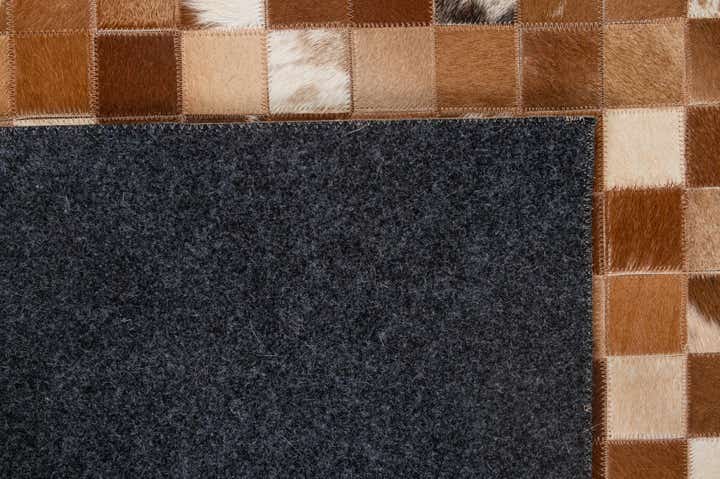 4' 11 x 7' 10 Cowhide - Patchwork Rug