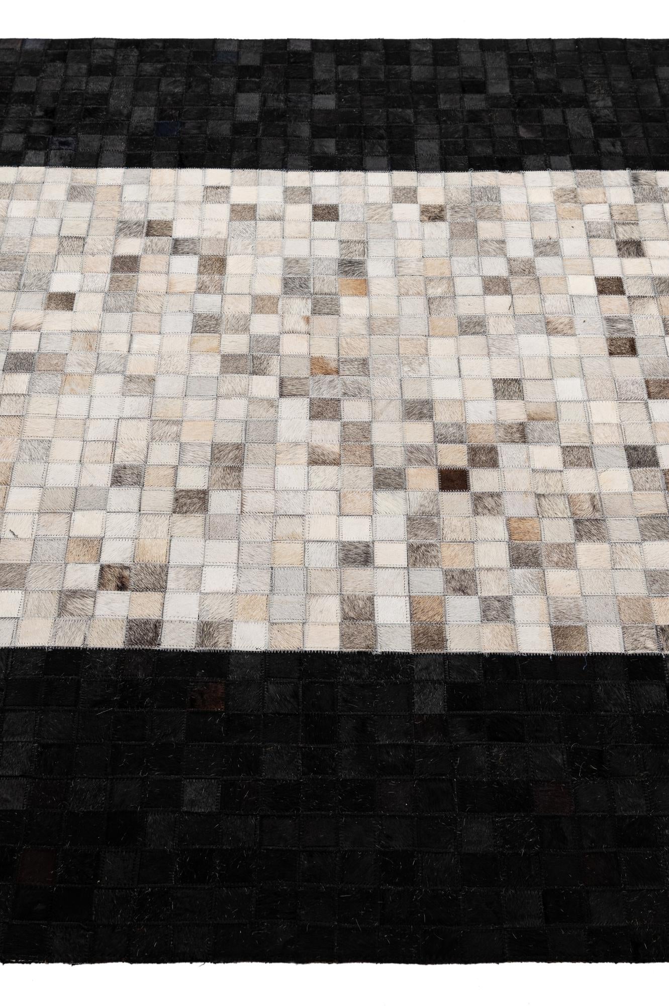 4' 11 x 7' 10 Cowhide - Patchwork Rug