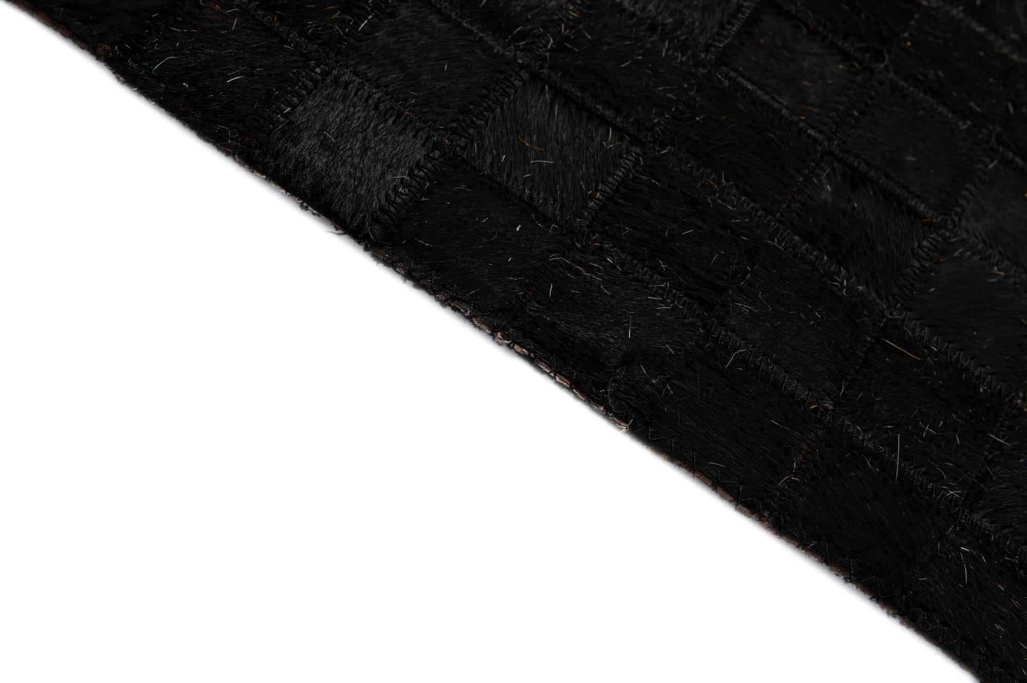 4' 11 x 7' 10 Cowhide - Patchwork Rug