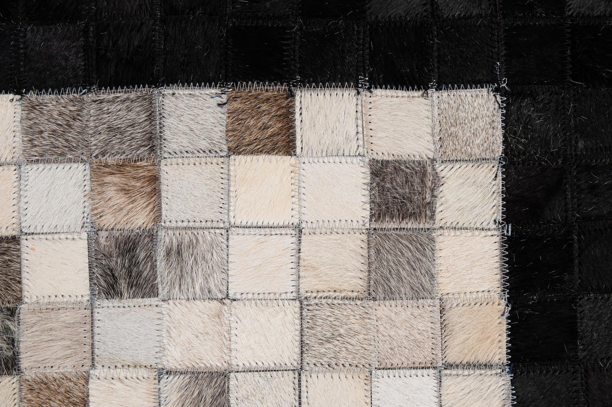 4' 11 x 7' 10 Cowhide - Patchwork Rug