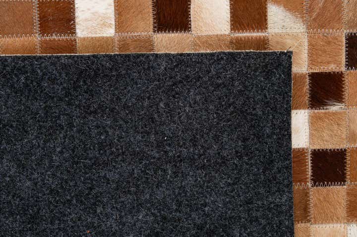 5' 1 x 7' 11 Cowhide - Patchwork Rug