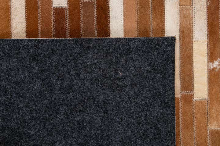 5' 1 x 7' 10 Cowhide - Patchwork Rug