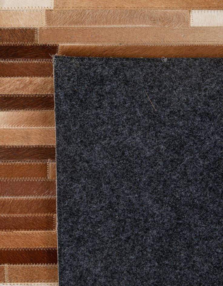 Detail image of 5' x 7' 11 Cowhide - Patchwork Rug