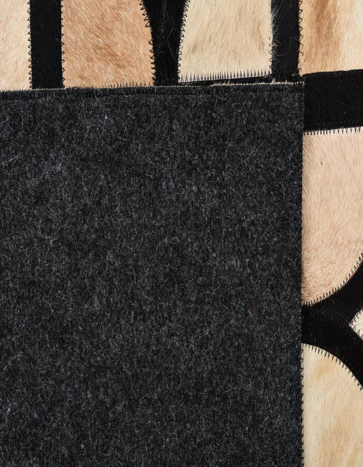 Detail image of 5' x 7' 10 Cowhide Leather Rug