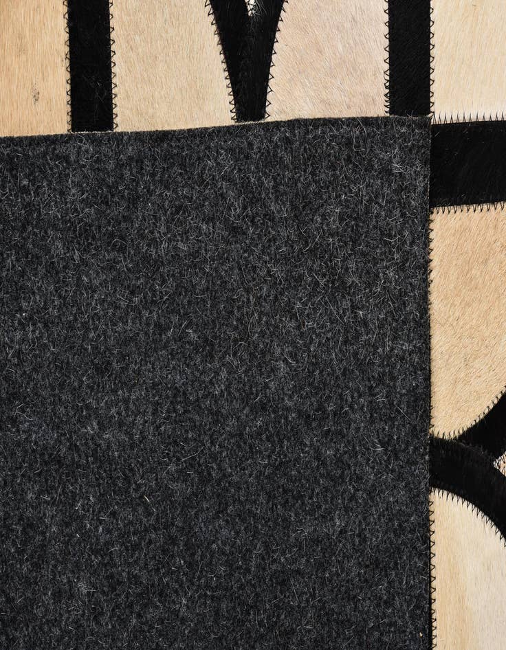 Detail image of 5' 1 x 8' Cowhide Leather Rug