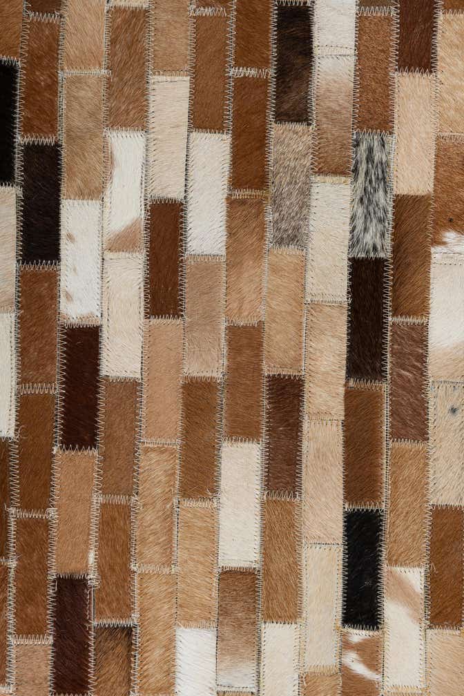 8' 1 x 9' 9 Cowhide Leather Rug