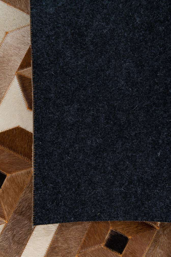 5' 1 x 8' 1 Cowhide Leather Rug