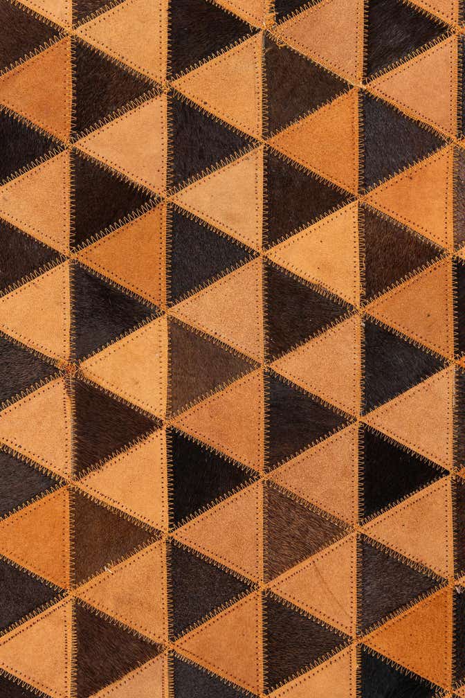 5' 2 x 8' 1 Cowhide Leather Rug