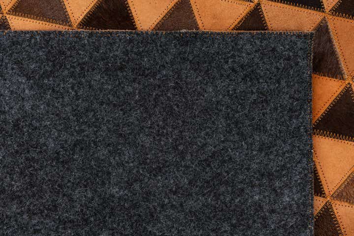 5' 2 x 8' 1 Cowhide Leather Rug
