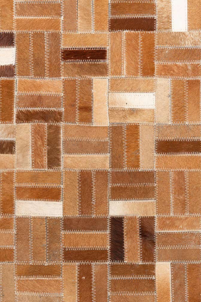 5' x 7' 10 Cowhide Leather Rug