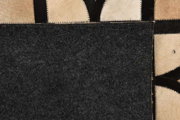 5' x 7' 9 Cowhide Rug